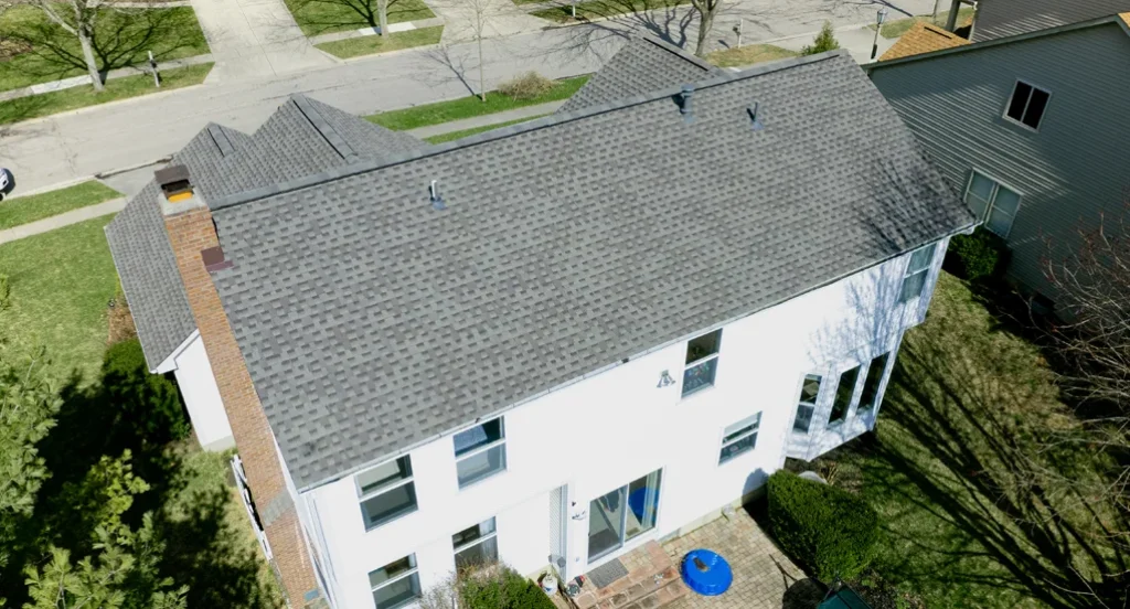 Roofers Bethlehem PA completing asphalt shingle roof repair on residential home — roofing Bethlehem and contractors in Bethlehem PA