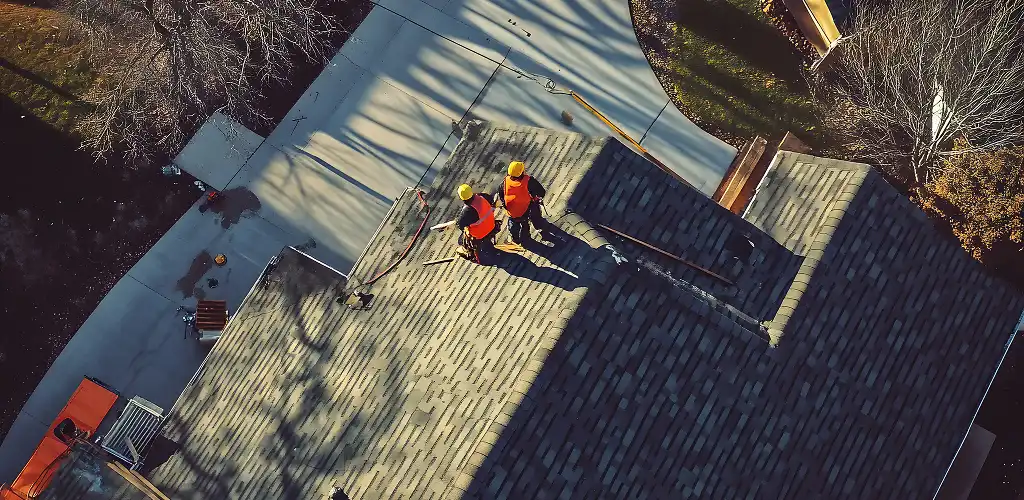 Roof inspection process guide with a professional roofer inspecting a home in Allentown