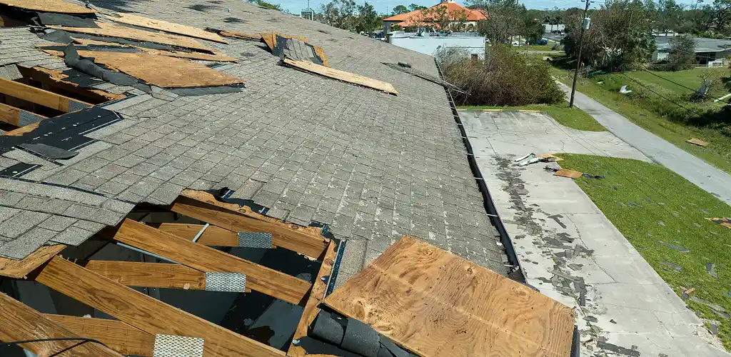 Roof repair vs replacement Allentown home with a roofing professional discussing options with a homeowner