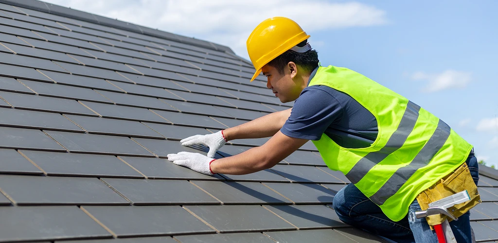 Roof inspection frequency Allentown professional inspecting a roof in Allentown, PA