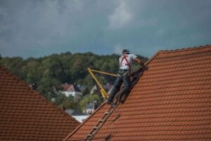 Image of Roofer repairing roof in Center Valley PA