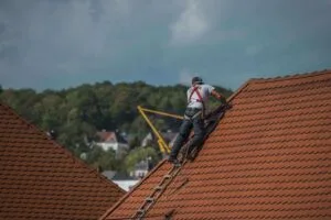 Image of Roofer repairing roof in Center Valley PA