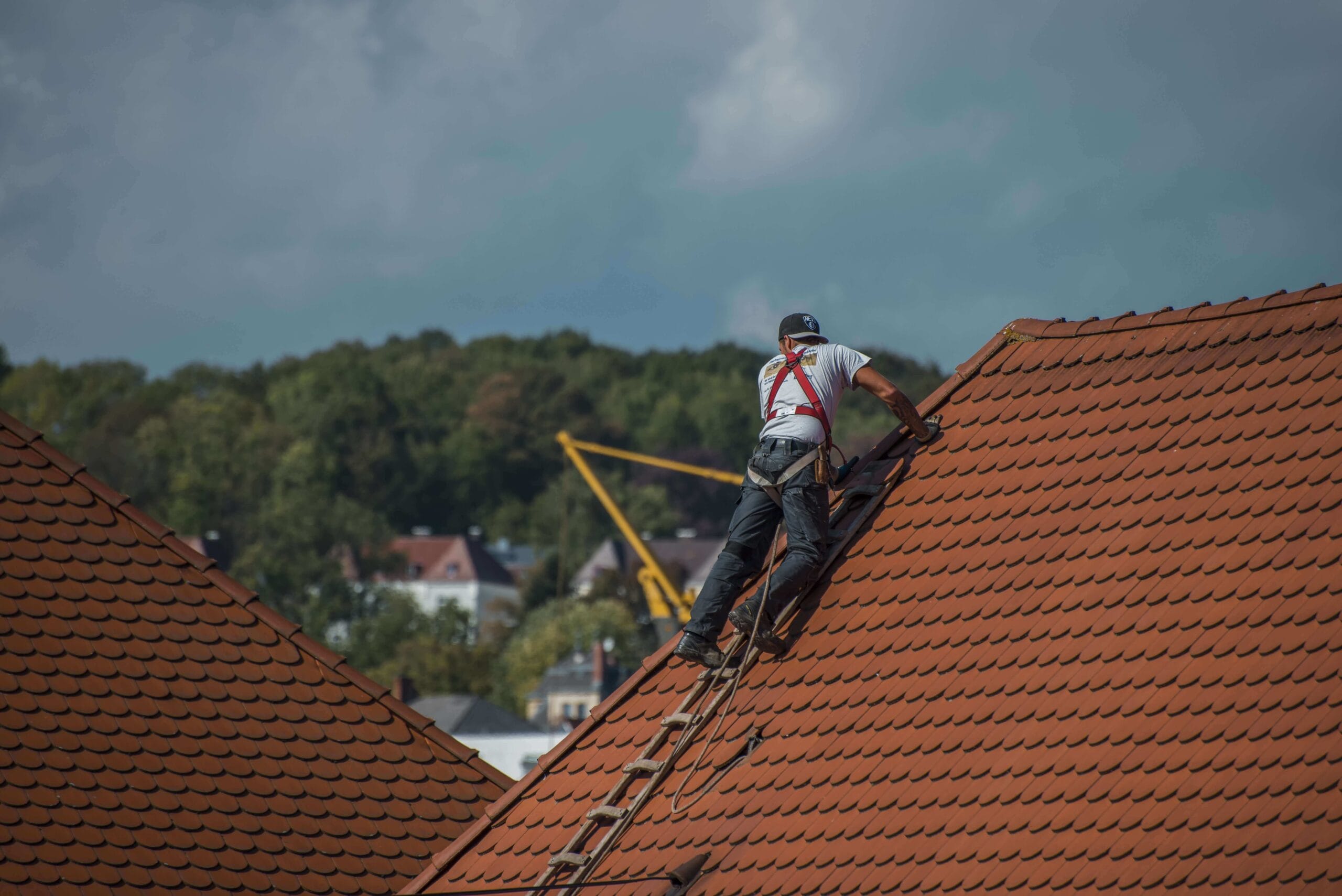 Image of Roofer repairing roof in Center Valley PA